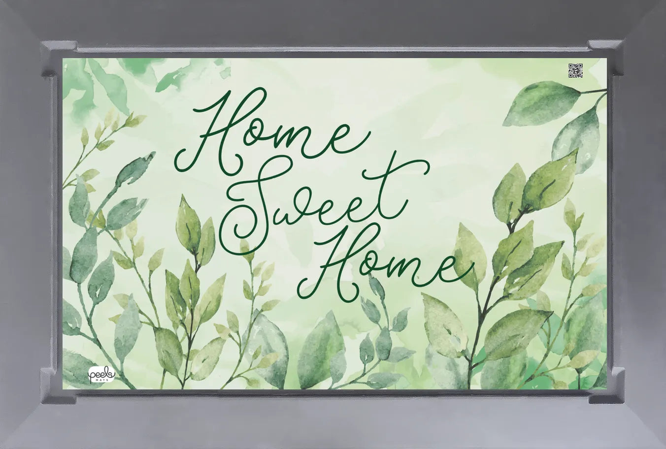 Peels Mats The Home Sweet Home peelable mat system at a home entryway threshold, welcoming design layer on a durable rubber base with peelable antimicrobial sheets